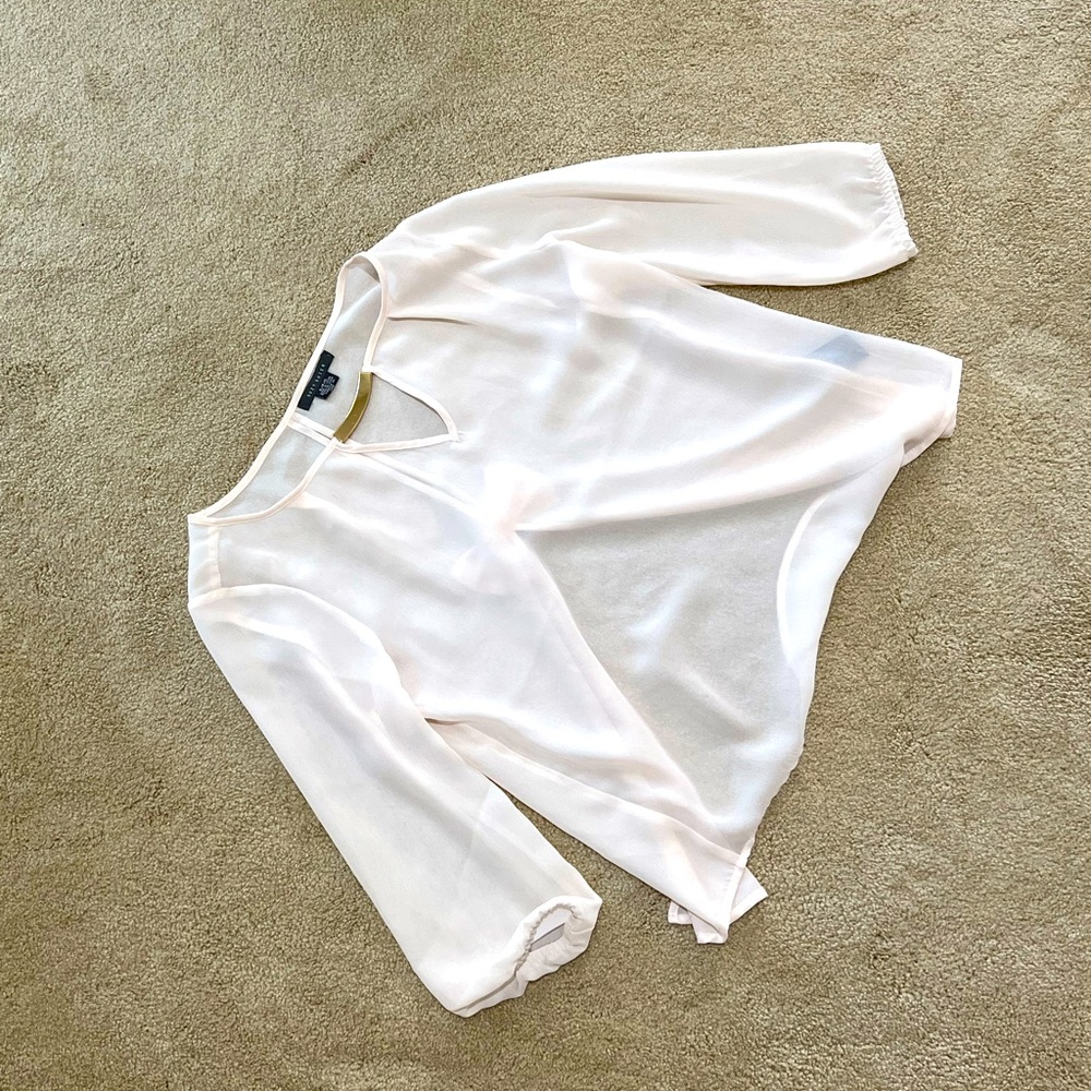 Cutest white blouse with the perfect details!